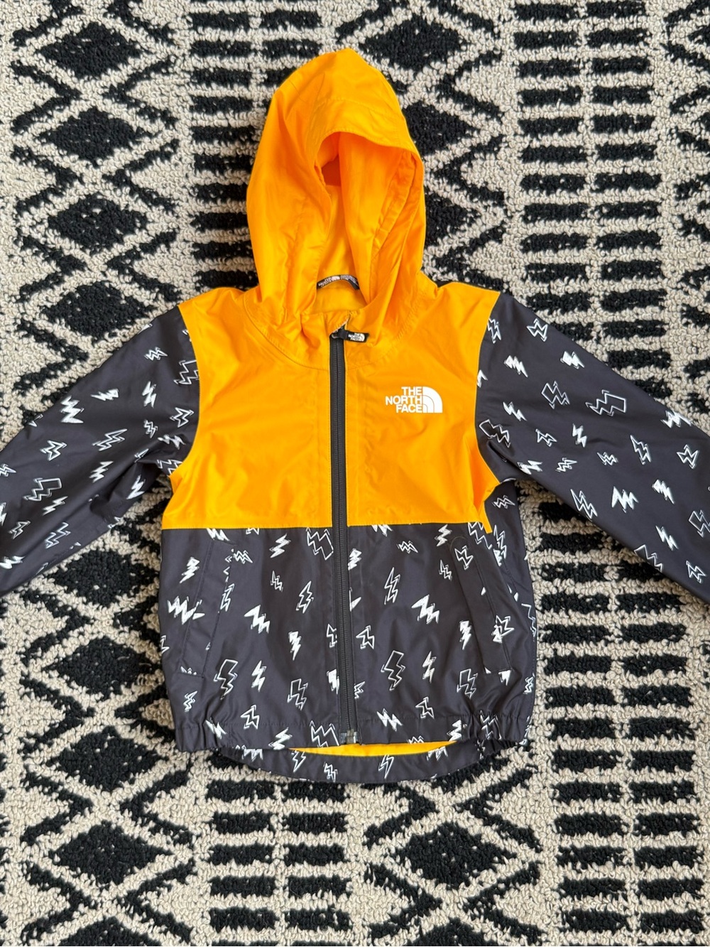 The North Face Yellow Lightning Bolt Rain Jacket